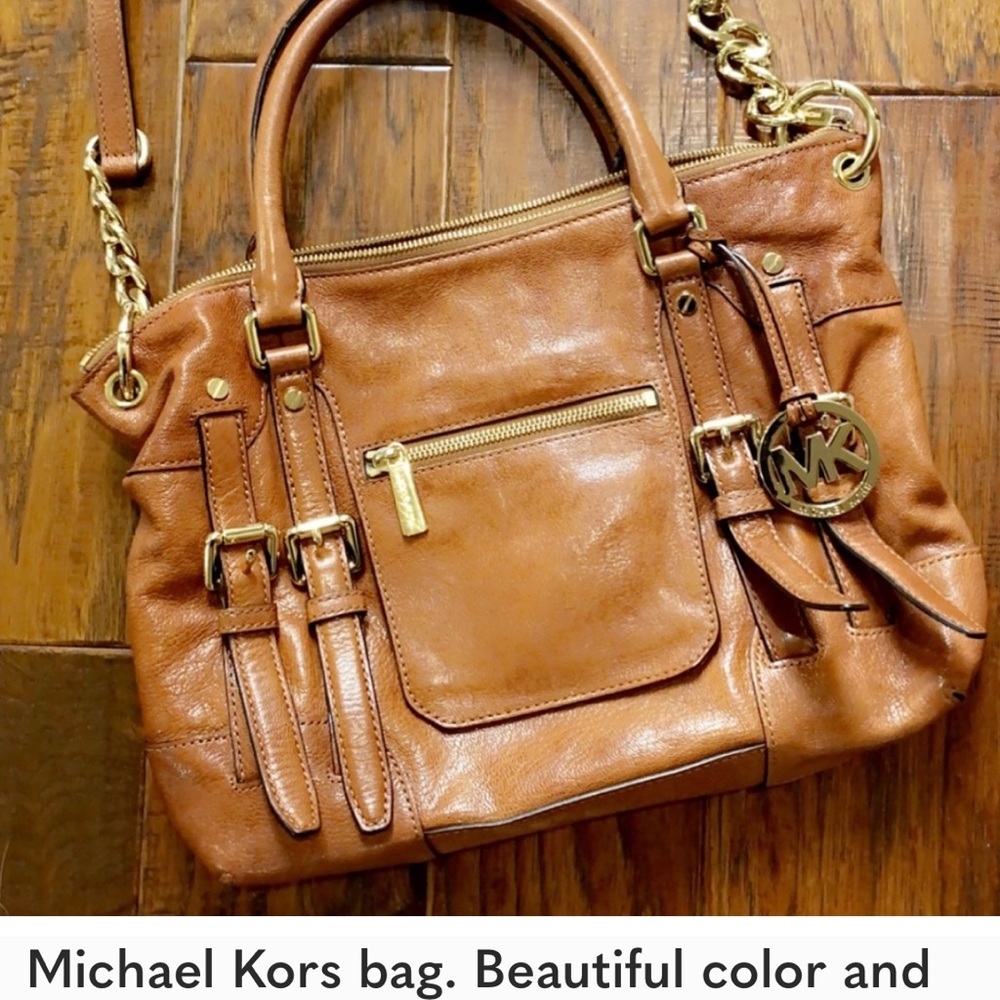 Beautiful Michael Kors authentic bag. Carried it many time. Great condition!